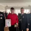 [FOTO] Młody druh OSP Cieszyn-Pastwiska odznaczony za bohaterską postawę